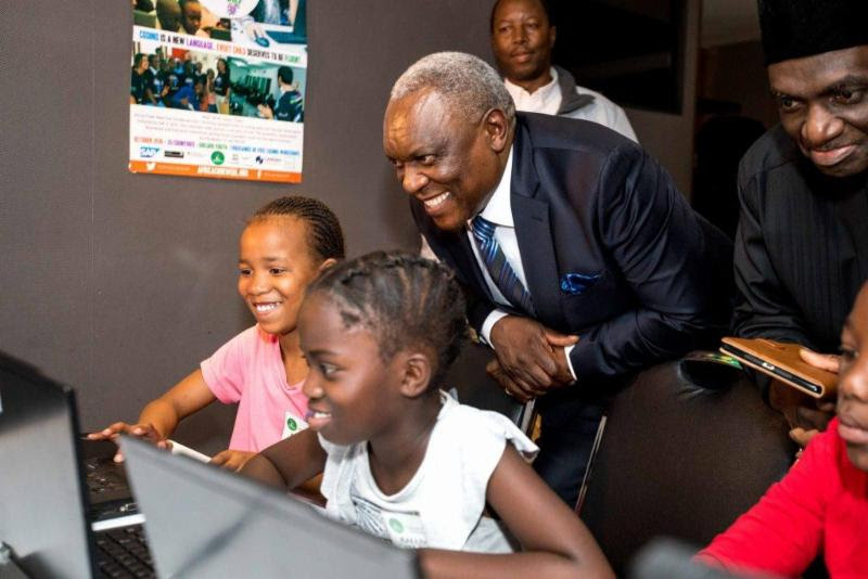 South African Minister of Telecommunications, Postal Services_ Dr Siyabonga Cwele_ celebrated International Teachers Day at the SAP Africa Code Week 2018 launch held in Johannesburg on Friday. Pictured above, Hon. Dr Siyabonga Cwele showcased the importance of computer code to sisters, Nosipho and Karabo Mayisa. This year's Africa Code Week initiative aims to empower more than 600,000 youth across 36 African countries during the month of October.