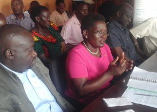 Dr Roseline Nyamuntale (cenre) speaking during press conference at the Sasakawa Global 2000 Uganda in Kampala