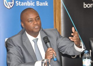 Mr Patrick Mweheire teh Chief Executive Stanbic Bank addressing the media during the launch of the wealth proposition