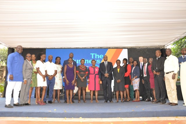 Stanbic Bank CE Patrick Mweheire poses for a group photo with some of the entrepreneurs who graduated from the second cohort of the bank’s Business Incubator.