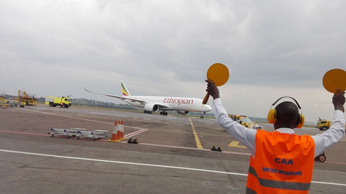 Flights into Entebbe International Airport (EIA) were momentarily put on halt this morning after Ethiopian Airlines Boeing -737- 800 flight number ET388 on a regular service from Addis Ababa to Entebbe, Uganda skidded off the runway by a few meters.