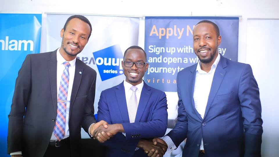 Mr. Donato Laboke, the General Manager Marketing & Brand at Sanlam General Insurance, Mr. Walter Wafula, the Business Unit Head-PR, brainchild Burson Cohn & Wolfe (BCW) and Mr. Brian Ntambirweki, the Marketing Director, Virtual University of Uganda shaking hands at the sponsor announcement of the Third Edition of Innovation Series on 26th February 2019 at the brainchild offices in Kampala