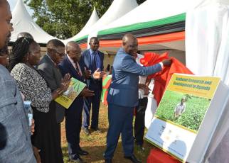 Agriculture, Animal Industry and Fisheries Minister Vincent Bamulangaki Ssempijja launching a new soybean variety (Maksoy 6N) developed by Makerere University at Kabanyoro Agricultural Research Institute in Wakiso District on February 22