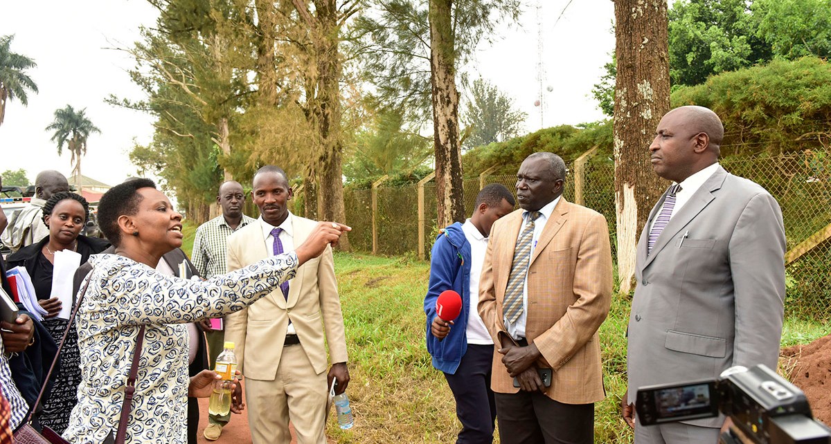 Lt. Col Edith Nakalema interfaces with Mbarara district leaders as she inspected some of the controversal plots of land under investigation by the anti corruption unit of State House over alleged corruption. Feb 22.