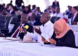 Museveni in the middle, Ms Suluhu (right) and Kenyan Deputy President Ruto at the Africa Now Summit in Munyonyo