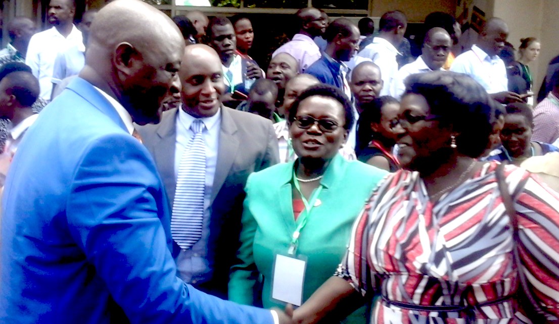 Agriculture Minister Vincent Bamulangaki Ssempijja talks to participants