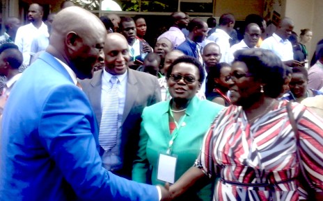 Agriculture Minister Vincent Bamulangaki Ssempijja talks to participants