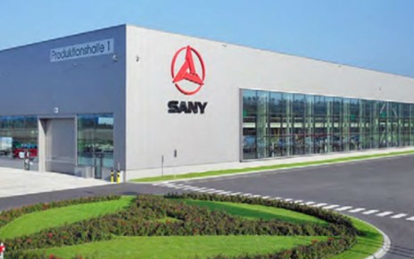 The showroom displays various equipment on offer, including concrete machinery, road machinery, excavators, mixer trucks, tipper trucks and firefighting machinery among others.