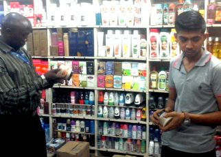 UNBS Officer checking the cosmetics in one of the Shop