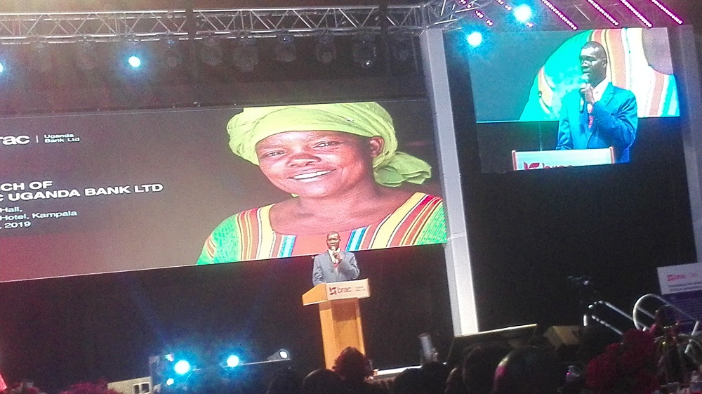 Jimmy Onesmus Adiga the BRAC Uganda Bank Ltd Chief Executive Officer speaking during the launch at Kampala Serena Hotel.