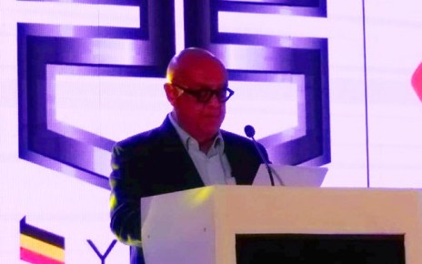 Roofings Group chairman Sikander Lalani addressing the audience in Namanve on Tuesday