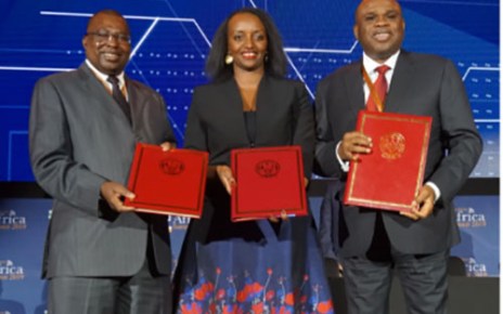 Albert Muchanga, Commissioner for Trade and Industry, African Union (left); Soraya Hakuziyaremye, Minister of Trade and Industry of Rwanda (centre); and Afreximbank President Prof. Benedict Oramah with the hosting agreement following the signing ceremony in Kigali.
