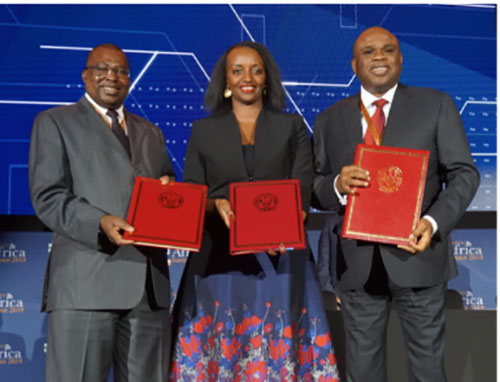 Albert Muchanga, Commissioner for Trade and Industry, African Union (left); Soraya Hakuziyaremye, Minister of Trade and Industry of Rwanda (centre); and Afreximbank President Prof. Benedict Oramah with the hosting agreement following the signing ceremony in Kigali.