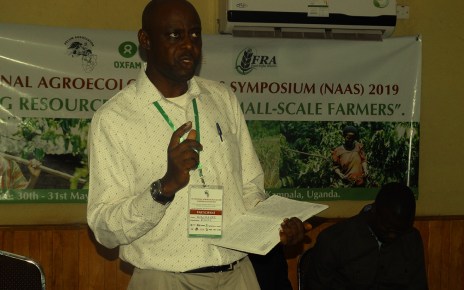 Hakim Baliraine, the ESAFF Uganda chairperson, making presentation during the symposium