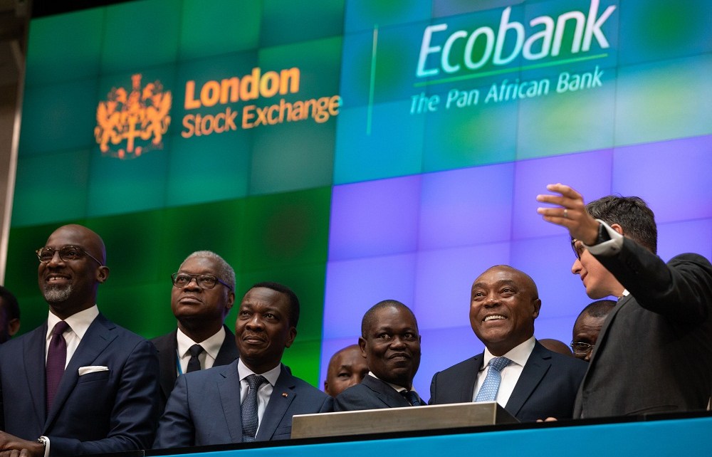 Ecobank Chairman Emmanuel Ikazoboh (2nd from left) opens the London Stock Exchange with Group CEO Ade Ayeyemi (3rd from left)