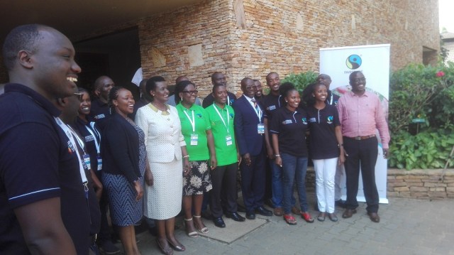 Fairtrade Africa members join Uganda's Minister of Trade, Industry and Cooperatives Amelia Kyambadde in a group photo at Speke Resort Munyonyo.