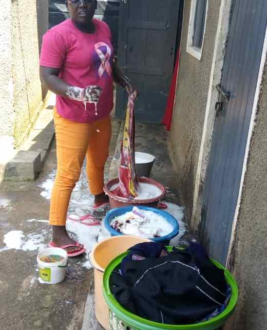 Akello is able to pay for her tuition with money earned from doing laundry