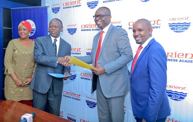 Remmie Kirunda Namutangula, Focal Person in charge of Incubation at MUBS, Prof. Waswa Balunywa, the University's Principal, Mr. Julius Kakeeto, Orient Bank's Managing Director and Emmanuel Njuki, Head of Corporate Communications and marketing at the Bank officially launch the 3rd edition of the ten week long Orient Business Academy.
