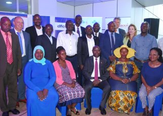 Pius Wakabi, the Permanent Secretary Ministry of Agriculture (centre) in a group picture with some of the farmers