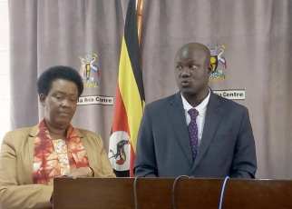 Minister Kabatsi on( left) and Dr Lagu at the Media Center in Kampala on Tuesday