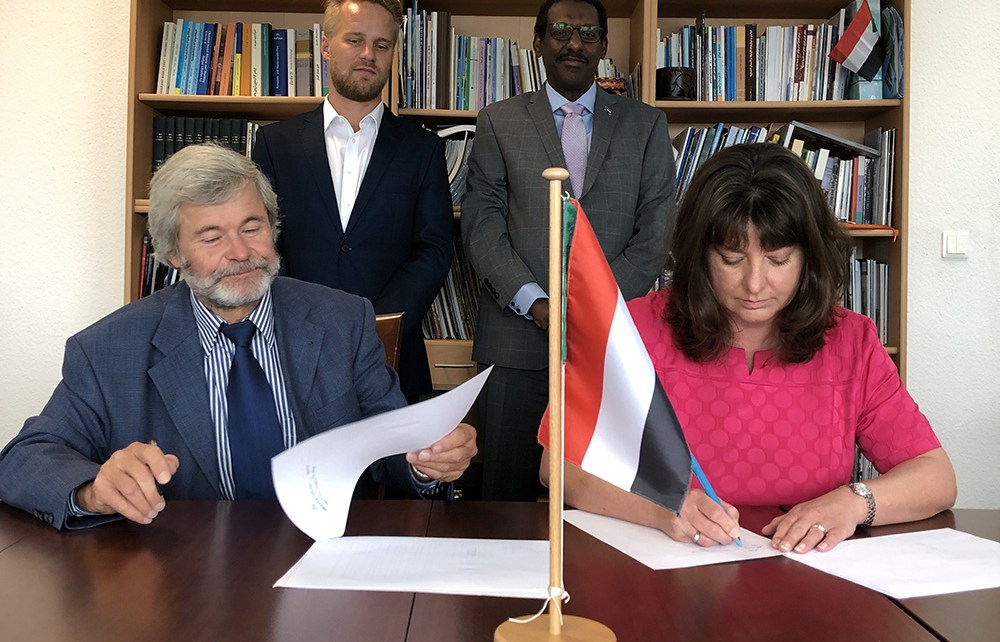 Ms Sabine Dall'Omo (right) - Chief Executive Officer, Siemens Southern and Eastern Africa Dr Detlef Virchow (left), Plan International Deutschland Mr Al Walead Hassan Abdo (back right), Counsellor, Sudan Embassy, Berlin, Mr Stefan Sager (back left), Country branch Manager, Siemens Sudan