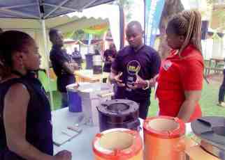 Supa Sigiri Sales Representatives showcase the different types of Supa Sigiris to revelers during the Supa Sigiri Cook Off held at Capital FM grounds on 23rd August 2019. Supa Sigiris come in 7 brands that are designed to use less charcoal, emit less charcoal and cook faster than ordinary sigiris.
