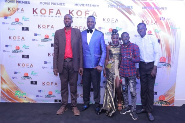 Steven Ayeny (Blue Suit) the brain behind the movie and fellow actors during the premiering at Century Cinemax on Acacia Mall.