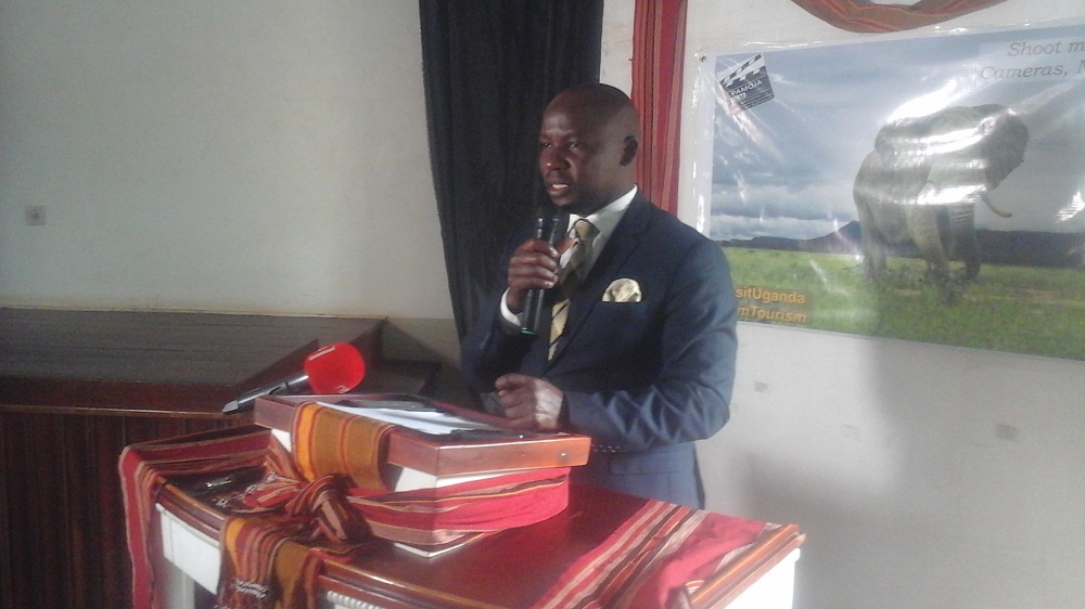 Uganda's State Minister for Tourism Godfrey Kiwanda Suubi speaking during the launch.