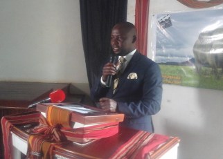 Uganda's State Minister for Tourism Godfrey Kiwanda Suubi speaking during the launch.
