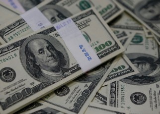 The Uganda shilling traded within confined ranges against the U.S. dollar on Monday as foreign currency flows evened out.