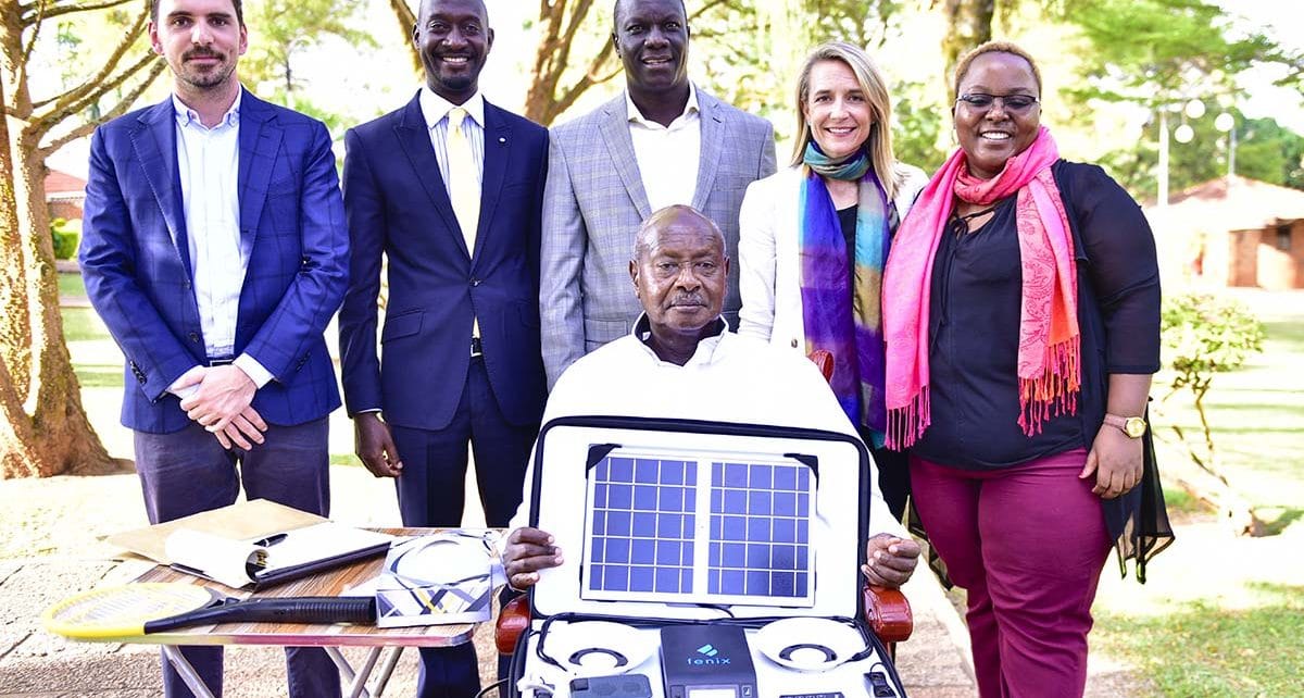 President Yoweri Kaguta Museveni carrying some a package of some of the products manufactured by Fonix industry as he posed for a photograph with a team from the Fonix industry shortly after their meeting at State House Nakasero on Saturday 30th March 2019.