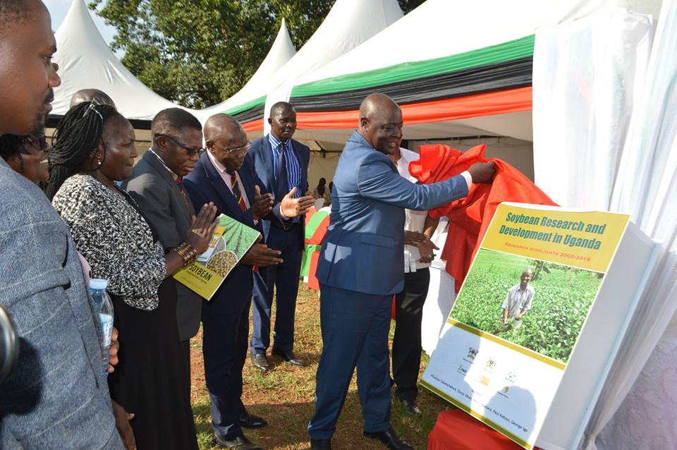 Agriculture, Animal Industry and Fisheries Minister Vincent Bamulangaki Ssempijja launching a new soybean variety (Maksoy 6N) developed by Makerere University at Kabanyoro Agricultural Research Institute in Wakiso District on February 22