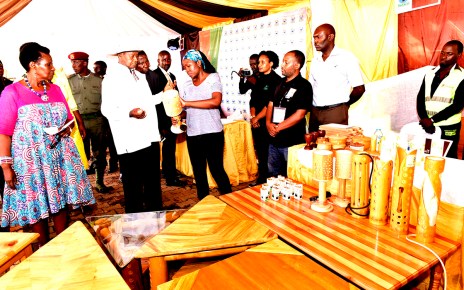 President Museveni touring the stalls at Kololo