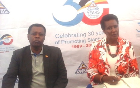 UNBS Executive Director Ben Manyindo and Minister of Trade Industries and Cooperatives Amelia Kyambadde during the event to mark 30 years of the agency