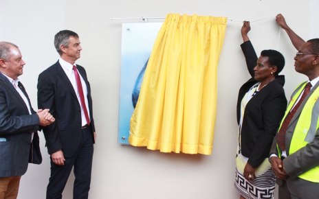 Minister of Trade Industries and Cooperatives, Amelia Kyambadde (2nd right) commissions the Rwenzori Pure Natural Water production line at Namanve Industrial park in Mukono District on Tuesday