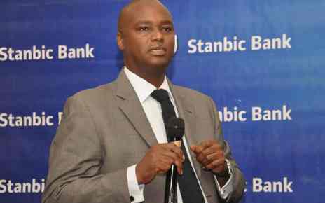 Stanbic Bank Chief Executive Patrick Mweheire, speaks during the release of the Half Year Results at Protea Hotel