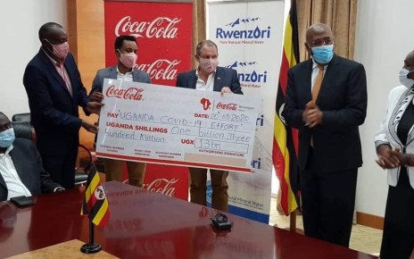 Coca-Cola Beverages Africa in Uganda has handed over its contribution of UGX1.3billion (One Billion, Three Hundred Million Shillings) with three brand new pick-up trucks added to the Ministry of Health COVID-19 fleet.