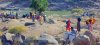 Ethiopian refugees, fleeing clashes in the country's northern Tigray region, cross the border into Hamdayet, Sudan, over the Tekeze river.